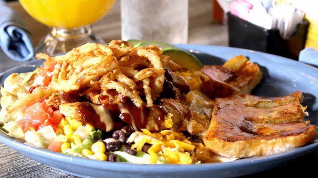Bbq Ranch Chicken Salad · Grilled Chicken, avocado, tomato, corn, black beans, and cheddar cheese, mixed lettuce, tossed in our BBQ ranch with Crispy fried onion strings, drizzle with barbecue sauce.