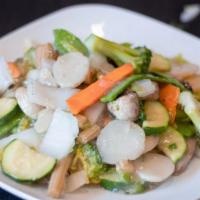 Sauteed Garden Vegetables · An assortment of vegetables, (broccoli, zucchini, mushroom, snow peas, carrots, napa cabbage...