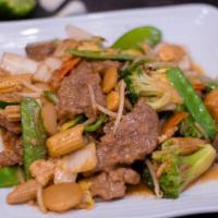 Beef Chop Suey · Tender sliced beef with Napa cabbage, broccoli, zucchini, carrots, mushroom, water chestnuts...