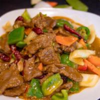 Curry Beef · Hot. Tender sliced beef with carrots, diced bell pepper and onion stir fried in a yellow cur...