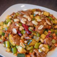 Kung Pao Beef · Hot. Tender sliced beef with bell peppers, zucchini, celery, carrots and water chestnuts sti...