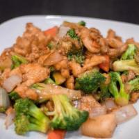 Chicken With Broccoli · Sliced white meat chicken with broccoli, carrots and onions stir fried in brown sauce.