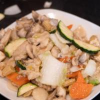 Mushroom Chicken · Sliced white meat chicken with mushroom, napa cabbage, carrots and zucchini stir fried in li...