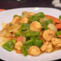 Curry Shrimp · Hot. Shrimp with carrots, diced bell pepper and onion stir fried in a yellow curry sauce. Ho...