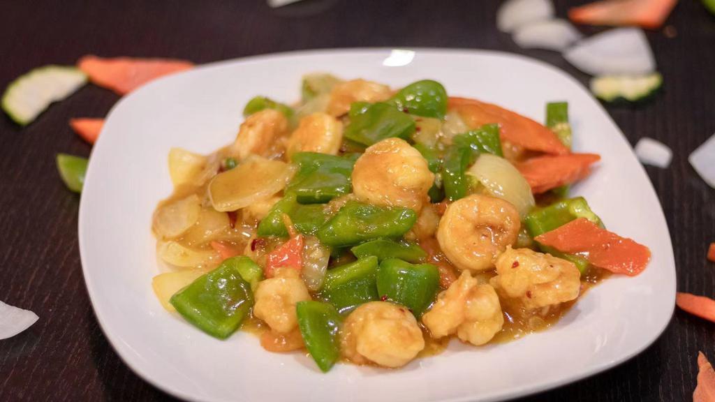 Curry Shrimp · Hot. Shrimp with carrots, diced bell pepper and onion stir fried in a yellow curry sauce. Hot and spicy.