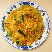 Singapore Rice Noodles · Hot. Thin rice noodle with bell pepper onion, BBQ pork, chicken and shrimp wok stir fried in...