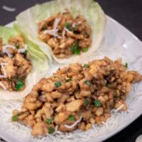Chicken Lettuce Wraps · Minced chicken with mushrooms, water chestnuts and green onions wok stir fried in a house sa...