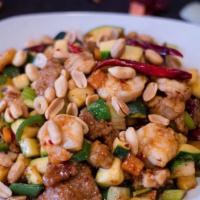 Combination Kung Pao · Hot. A combination of chicken, beef and shrimp with zucchini, celery and carrots, wok stir f...