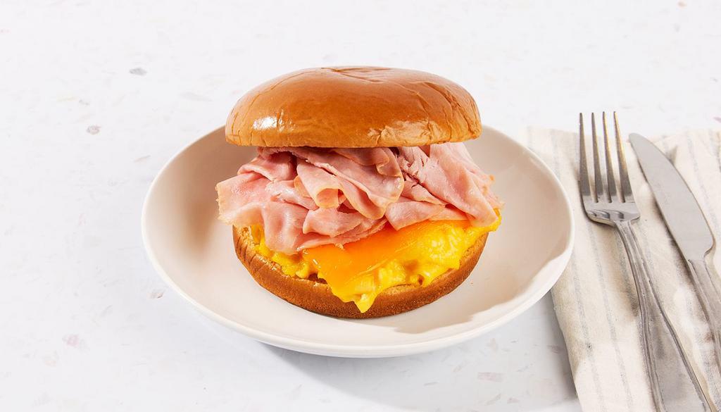Ham Egg And Cheese Breakfast Sandwich · One egg with melted cheese and delicious ham on your choice of bread.