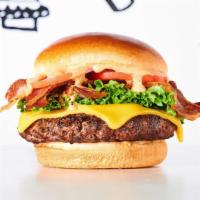 Vagabond Cheeseburger · Burger, lettuce, tomato, American cheese, beef bacon & Mob Sauce
