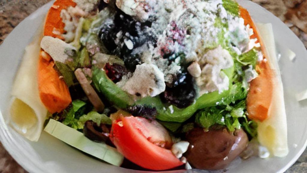Lg Vegetarian Antipasto · Tossed Salad with fresh mushrooms, broccoli, provolone, mozzarella, parmesan, black olive & house vinaigrette dressing.