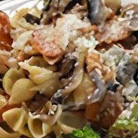 Pasta Primavera · Broccoli, carrots, and mushrooms sauteed with garlic and olive oil. Tossed with pasta and pa...