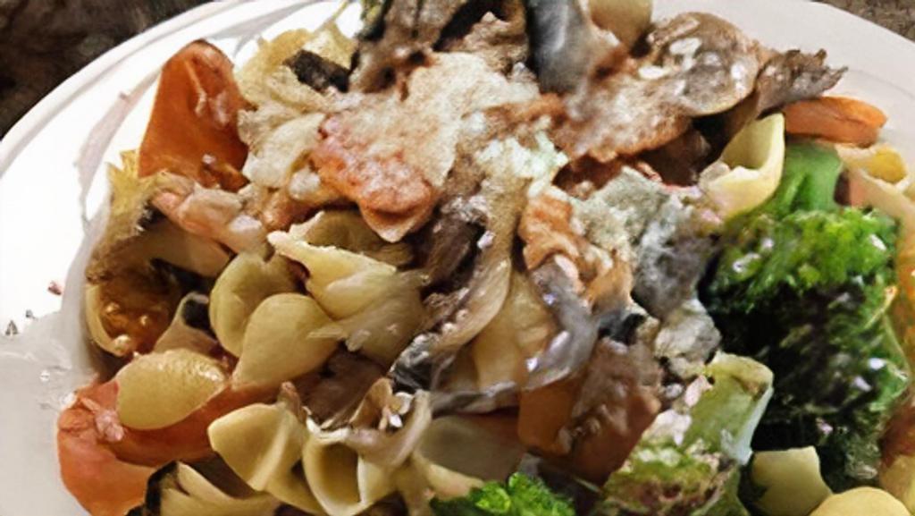 Pasta Primavera · Broccoli, carrots, and mushrooms sauteed with garlic and olive oil. Tossed with pasta and parmesan cheese.