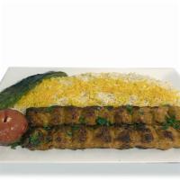 Chicken Lule · Chicken Lule kabob served with rice, grilled tomato & grilled pepper.