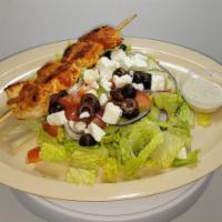 Capil Salad · Romaine lettuce, tomato, red onion, sunflower seeds, wonton strips, tuna, shrimp, Asian styl...