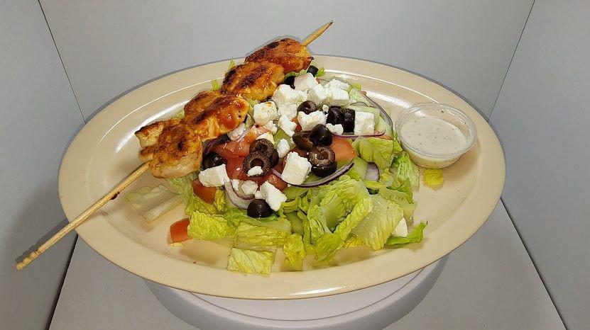 Capil Salad · Romaine lettuce, tomato, red onion, sunflower seeds, wonton strips, tuna, shrimp, Asian style sesame dressing.