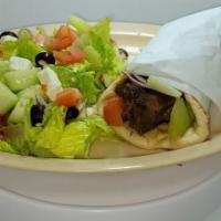 Chicken Wrap · Romaine lettuce, tomato, red onion, tzatziki, cucumber, choice of rice, or side salad.