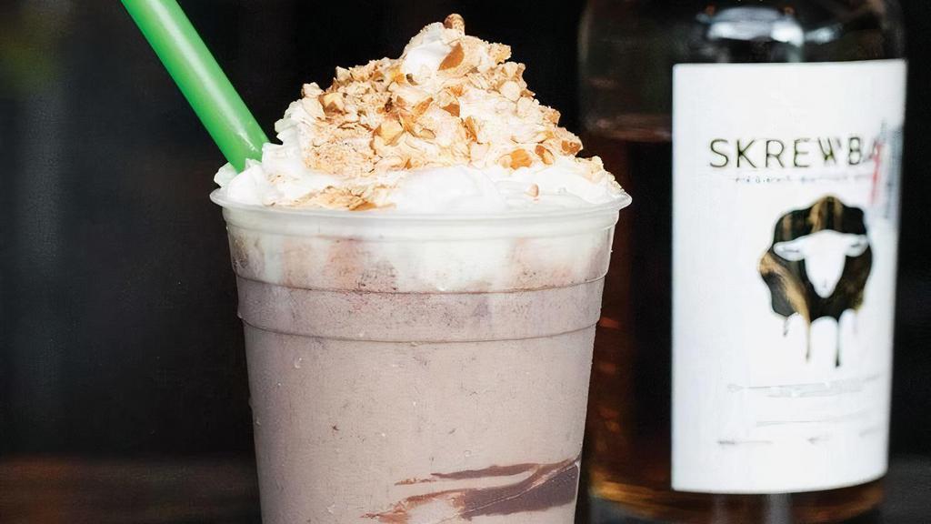 Boozy Nutella Chocolate Pretzel · Our signature custard blended with dark chocolate sauce, Nutella, pretzels & sea salt, topped with whipped cream. Served with Skrewball PeanutButter Whiskey.