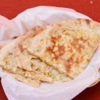 Cheese Naan · Leavened flour bread stuffed with cheese.