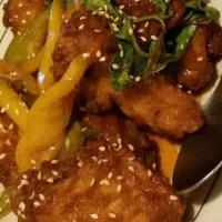 Chicken Wings (8 Pc) · Deep fried chicken wings served with sweet and sour sauce.