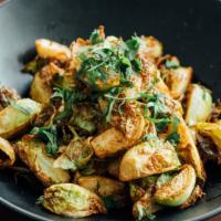 Brussels Sprouts · Vegan dish. Brussels sprouts sautéed cooked tossed in spices.
