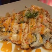 Baked Scallop Roll · Baked scallop with california roll.