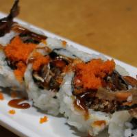 Salmon Skin Roll · Baked salmon skin and gobo with rice.