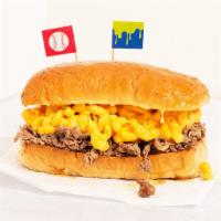 Mac N'Cheesesteak · Steak sandwich with mac n'cheese.
