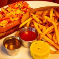 Lobster Roll · Butter-poached atlantic lobster, brown-butter aioli, arugula, melted butter, toasted brioche...