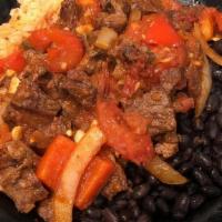 Steak Ranchero · Grilled sirloin steak sautéed with onion, bell peppers, tomatoes, garlic and ranchera salsa ...