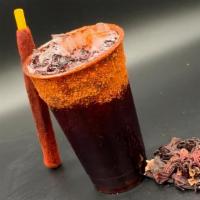 Jamaica Y Maracuya Preparada/Hibiscus-Passion Fruit Beverage W/Chili · Bebidas preparadas con vaso escarchado de chilito acompañadas de una barita de tamarindo. 

...