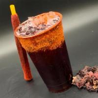 Jamaica Preparada/Hibiscus Beverage W/Chili · Bebidas preparadas con vaso escarchado de chilito acompañadas de una barita de tamarindo. 

...