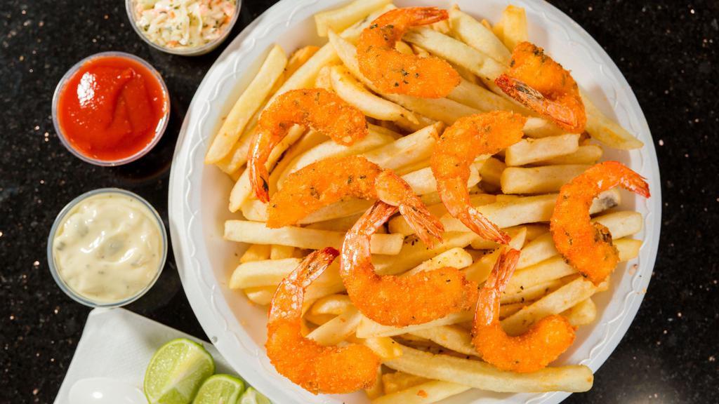 Camaron Empanizado/Breaded Shrimp · Acompanado de papas fritas, ensaladita y coleslaw.

Served with french fries, small  house salad and coleslaw.