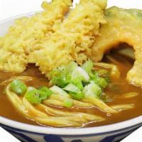 Tempura Curry Udon · Homemade udon noodle with Curry soup & 2 shrimps and pumpkin tempura.