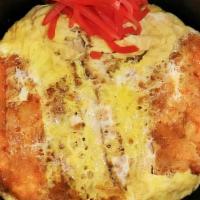 Pork Or Chicken Katsu Bowl · Deep fried pork or chicken katsu cooked with egg. Served over rice.