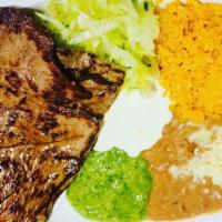 Carne Asada · Include rice and refried beans guacamole sour cream and lettuce.