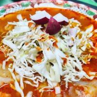 Large Pozole · our delicious homemade red pozole made with pork meat and hominy.
includes homemade tostadas...