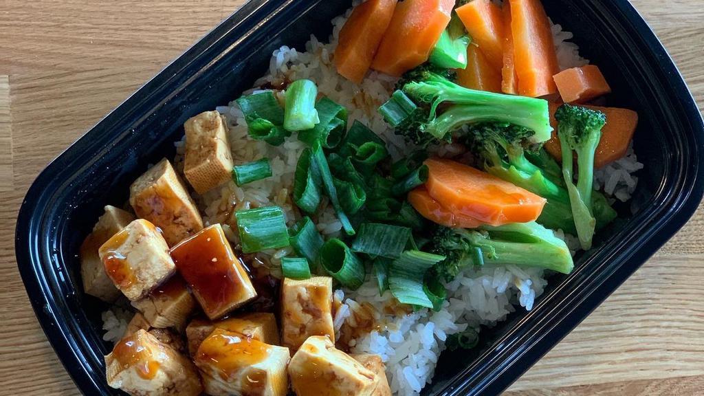 Tofu Rice Plate · Grilled Tofu, steamed rice, steamed broccoli and carrots. Grilled Tofu topped and cooked with house made 