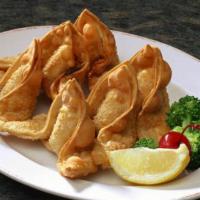 Crab Rangoons · 6 won ton chips stuffed with cream cheese and crab filling.