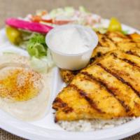 Chicken Breast · 2 marinated boneless skinless breasts, grilled. Served with garlic sauce.