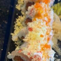 El Dorado Roll · Spicy crunchy tuna topped with tuna, salmon, albacore, yellowtail & avocado with snow crab &...
