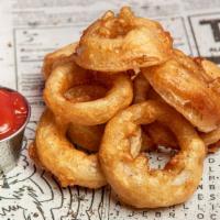 Deep Fried Onion Rings · tempura battered onion rings served with a side of truffle ketchup