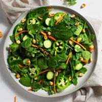 Thai Salad · Shredded carrots, cucumbers, cilantro, jalapenos, and peanuts with your choice of greens and...