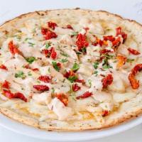Chicken Foutina Flat Bread · Freshly marinated chicken breast, fontina cheese, and sun dried tomatoes with sundried tomat...