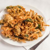 Pakora · Spinach, onion, potatoes, paneer, or mix fritter of your choice. Battered and deep fried.