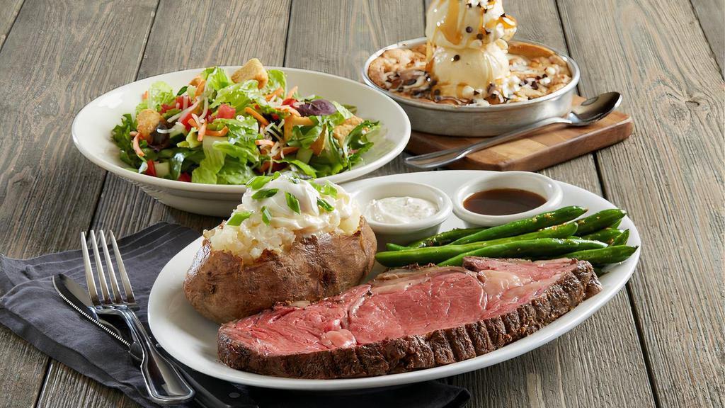 Prime Rib* · 15 oz. prime rib slow-roasted over four hours | au jus | creamy horseradish | choice of two signature sides | choice of soup or salad | choice of Pizookie®