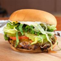 5 Oz. Beef Burger · Includes: mayo, mustard, lettuce, pickles, tomatoes, and grilled or raw onions.