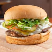 5 Oz. Turkey Burger · Includes: mayo, mustard, lettuce, pickles, tomatoes, and grilled or raw onions.