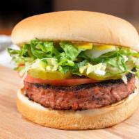The Beyond Burger · Plant based burger. Includes: mayo, mustard, lettuce, pickles, tomatoes, and grilled or raw ...