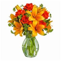 Fiery Lily & Rose · Spark someone's attention by sending this absolutely radiant bouquet. Full of flowers and fi...